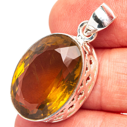 Oval faceted citrine gemstone pendant with .925 sterling silver bezel and bail