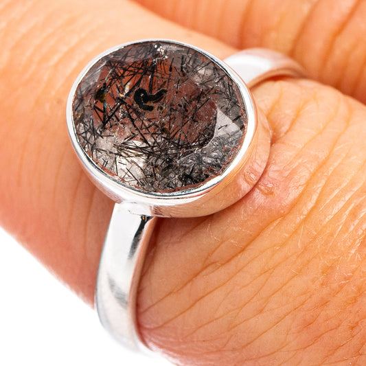 Sterling silver ring with round tourmalinated quartz cabochon, black and gray.