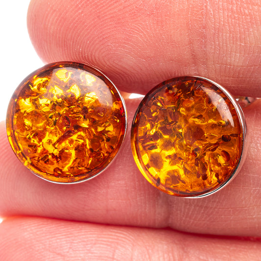 Round amber stud earrings with .925 sterling silver bezel, warm honey color