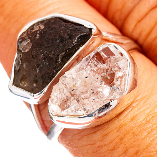 Sterling silver ring with dark rough stone and clear faceted crystal bezel setting
