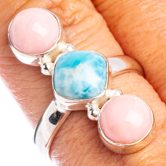 Sterling silver three-stone ring with pink opal and blue larimar oval cabochons