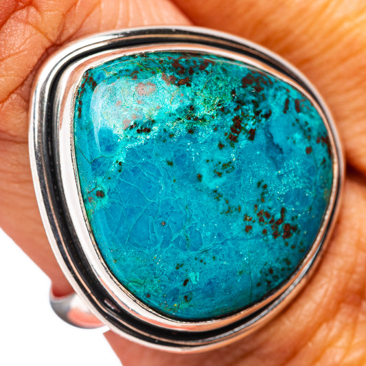 Sterling silver ring with oval turquoise-blue shattuckite gemstone bezel