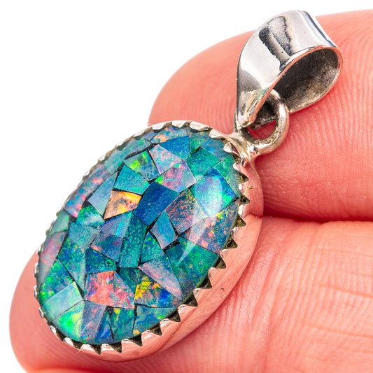 Opal pendant in .925 sterling silver with oval faceted triplet bezel, visible bail