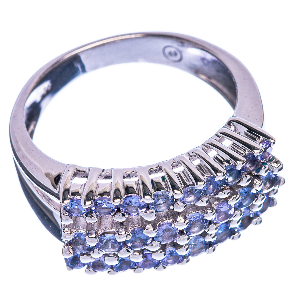 Sterling silver tanzanite ring with faceted blue stones set across the band, size 9
