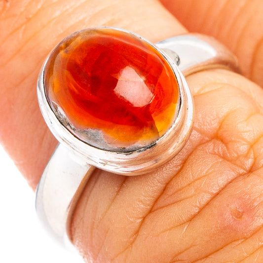 Sterling silver ring with oval red-orange fire opal cabochon, size 6