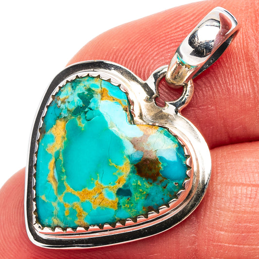 Turquoise heart pendant in sterling silver with oval bail and inlaid stone detail