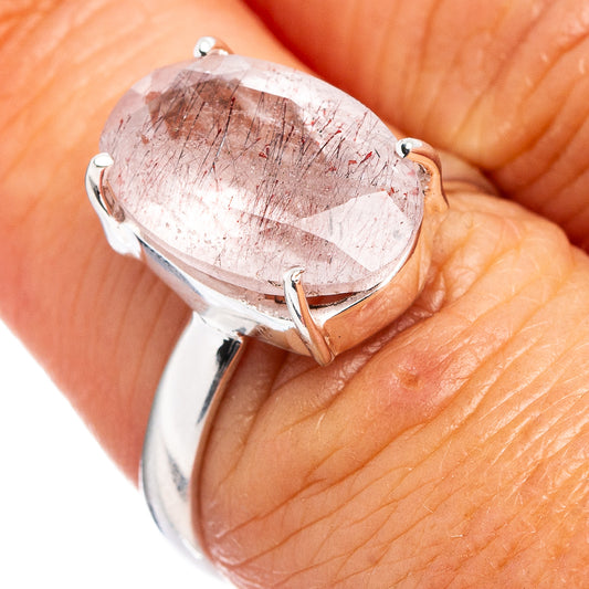 Sterling silver ring with oval pink stone, four-prong setting, ring size 6.75