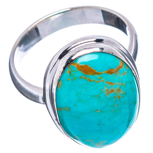 Turquoise oval cabochon sterling silver ring with oval bezel, side view