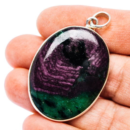 Oval fire ruby zoisite pendant in .925 sterling silver bezel, with loop bail