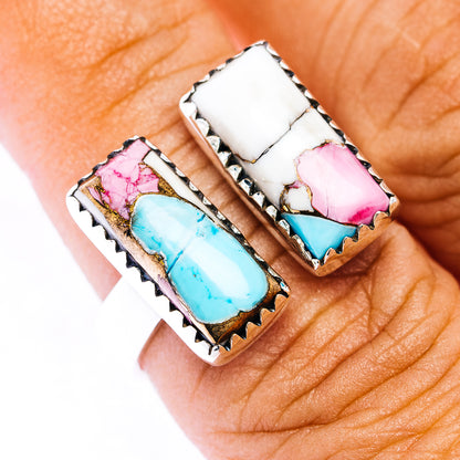 Sterling silver rectangular ring with bezel-set inlay, turquoise and pink stone accents