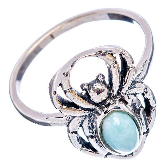 Sterling silver spider dainty ring with oval light-blue Larimar stone