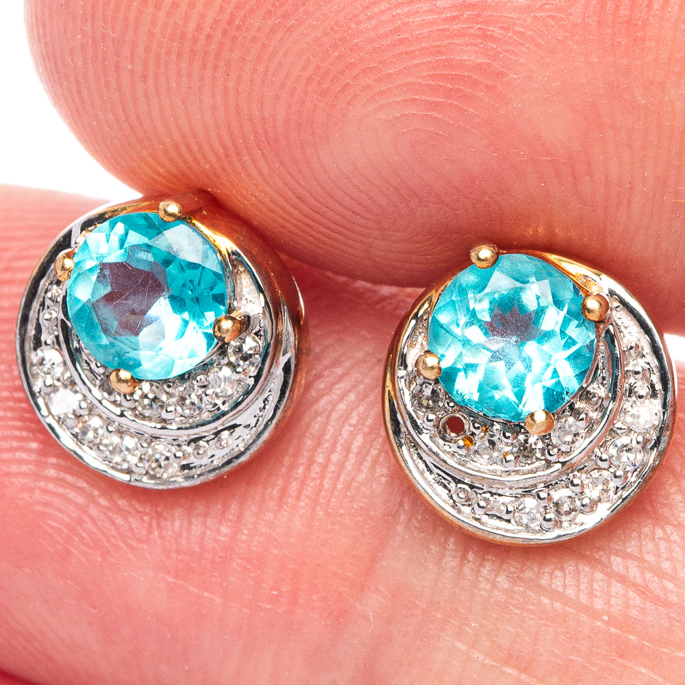 10k Gold Blue Topaz Earrings 3/8" (925 Sterling Silver) E433163