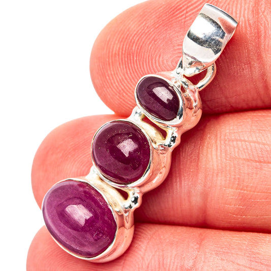 3-stone oval ruby pendant in .925 sterling silver, polished bezel set with magenta-red stones