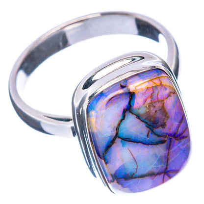 Sterling silver opal ring with oval blue-purple cabochon in curved bezel setting