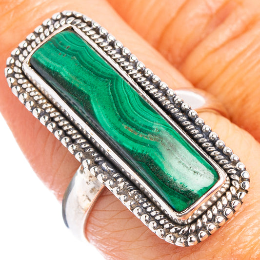 Rectangular green malachite sterling silver ring with beaded border and raised setting
