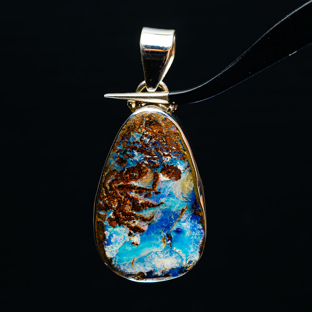Sterling silver teardrop boulder opal pendant with round bail, blue and gold stone