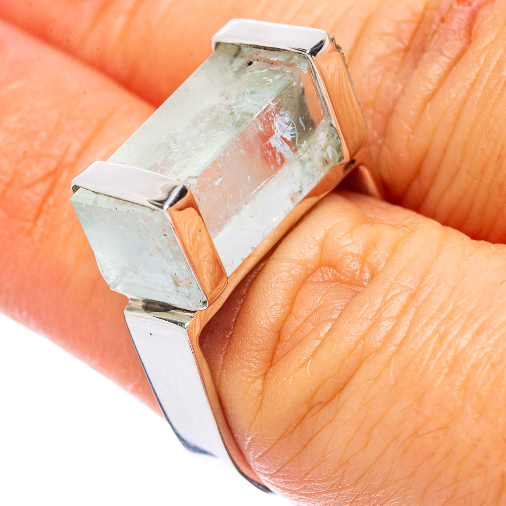 Sterling silver aquamarine ring with geometric faceted stone, side view