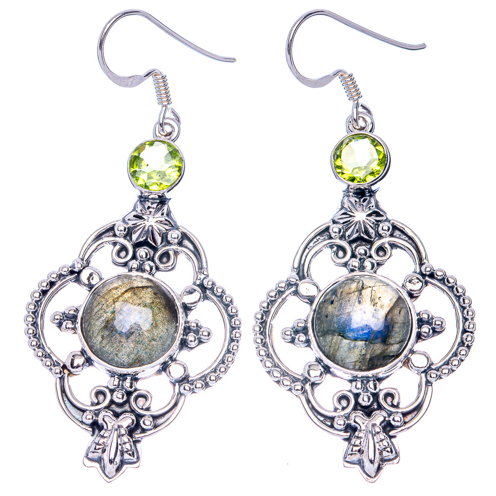 Pair of sterling silver earrings with oval labradorite cabochon, round green peridot, drop
