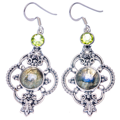 Pair of sterling silver earrings with oval labradorite cabochon, round green peridot, drop