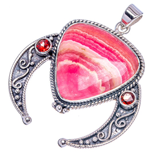 Rhodochrosite teardrop pendant with pink-and-white bands, red garnet details, silver setting