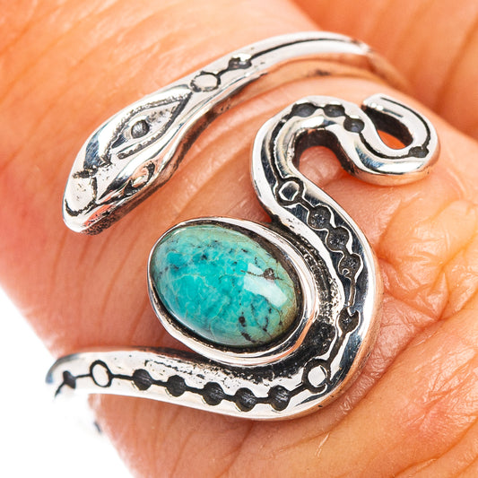 Turquoise oval stone snake ring detail in .925 sterling silver, textured metal border