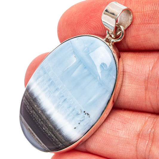 Oval blue opal cabochon pendant with sterling silver bail