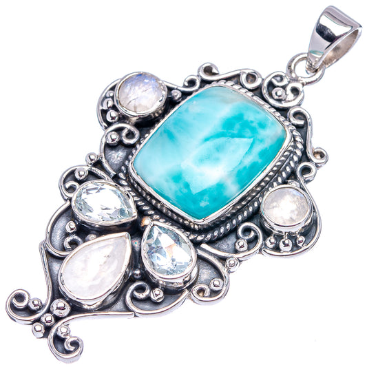 Sterling silver pendant with turquoise rectangle center and surrounding oval moonstone-like gems