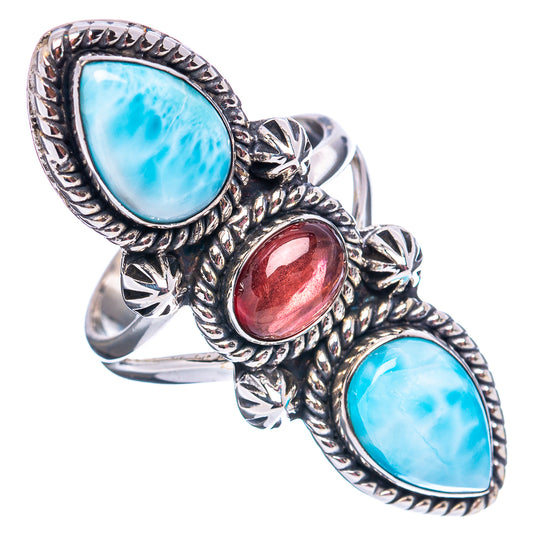 Three-stone sterling silver ring with blue oval cabochons and red oval garnet center