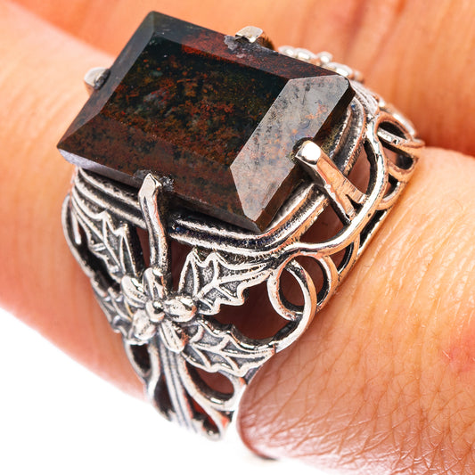 Sterling silver filigree ring with square dark mottled gemstone, decorative openwork sides