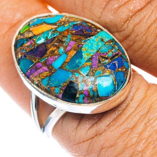 Oval mosaic inlay ring in turquoise, purple, and gold; sterling silver bezel, close-up