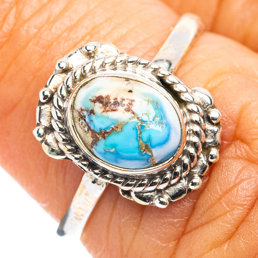 Sterling silver dainty ring with oval turquoise cabochon and ornate rope setting