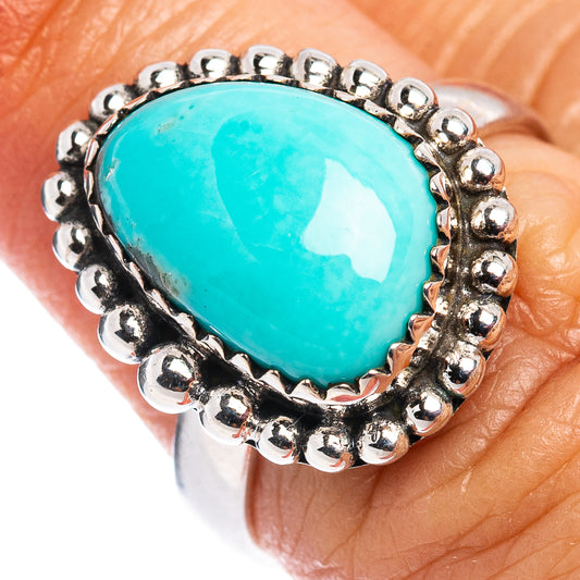 Turquoise cabochon ring in .925 sterling silver with raised bead bezel