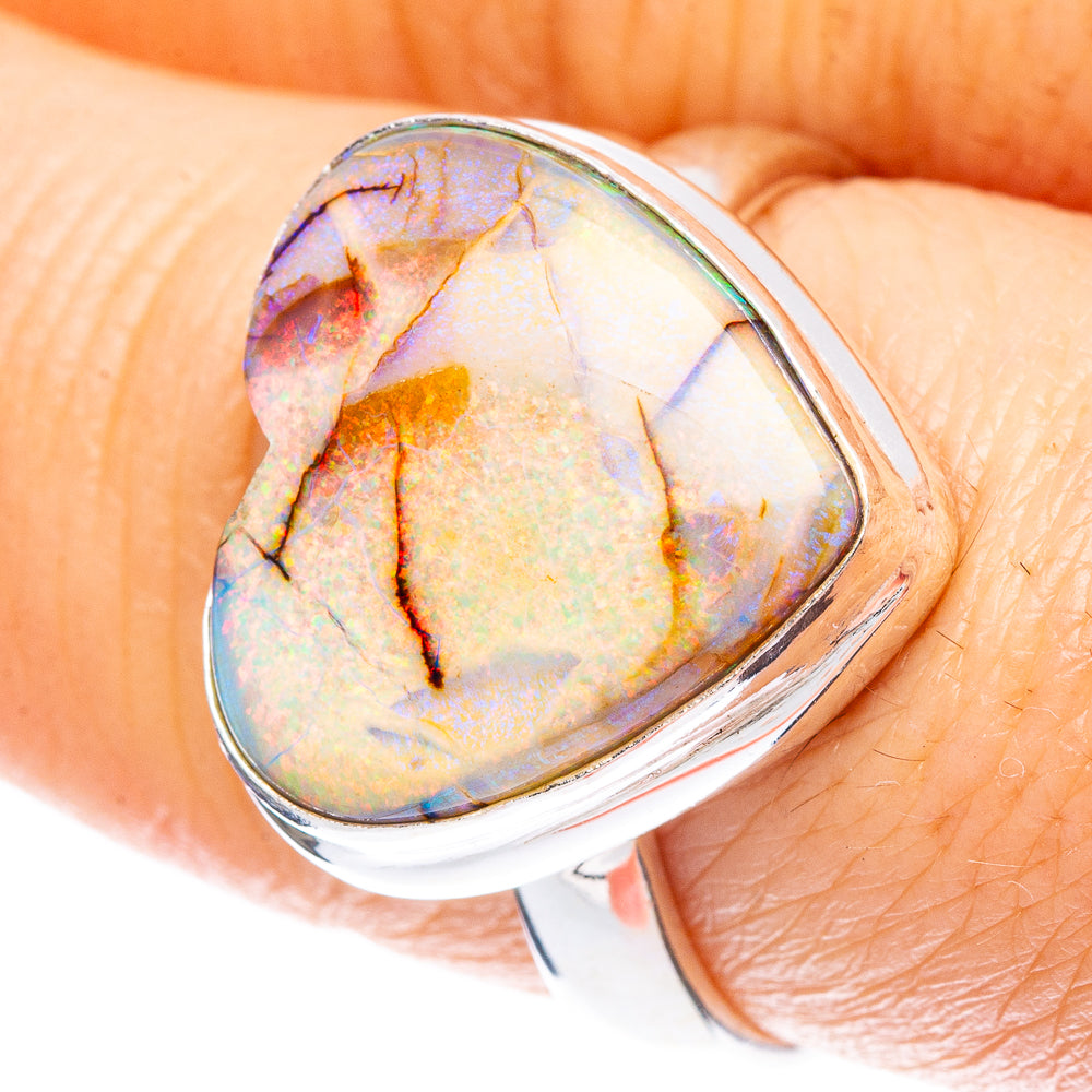 Heart opal ring in 925 sterling silver, orange-blue iridescent stone on band
