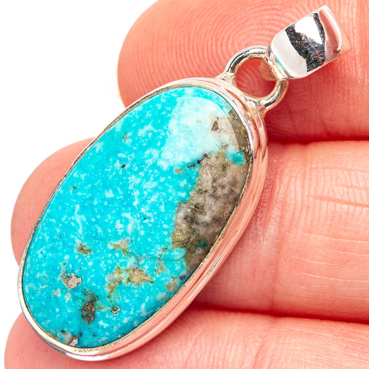Oval turquoise stone pendant in .925 sterling silver, with bail and visible matrix veins