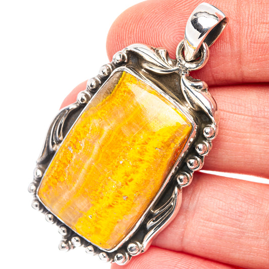 Sterling silver bumblebee jasper pendant with rectangular cabochon and bail loop.