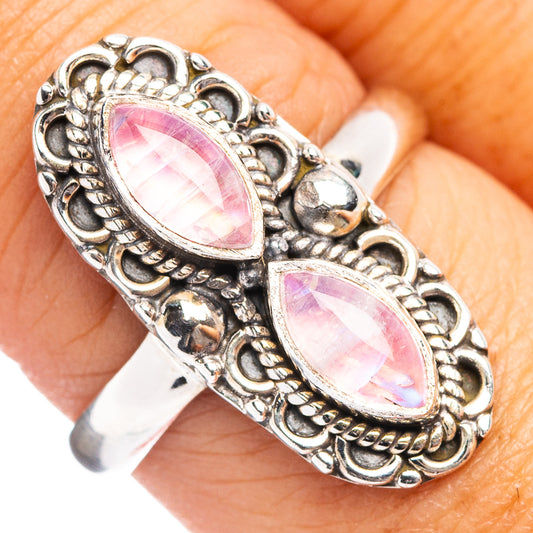 Sterling silver statement ring with two pink moonstone ovals in carved claw setting