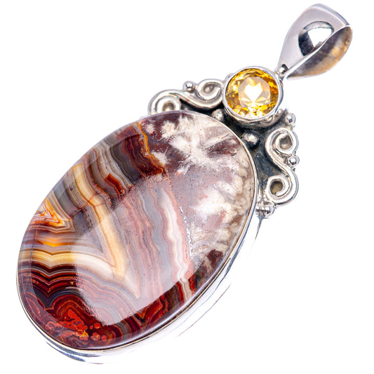 Sterling silver pendant featuring oval lace agate cabochon and round yellow citrine in bezel