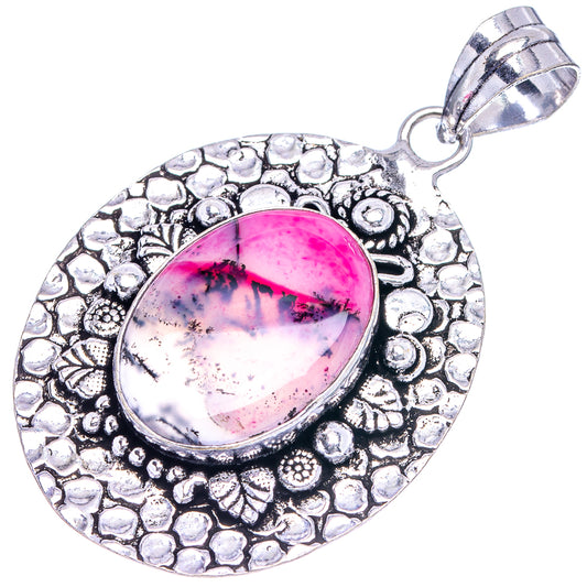 Oval pink dendritic opal pendant, ornate German-silver frame with hanging bail
