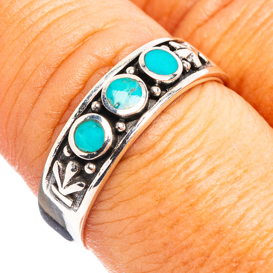 Turquoise inlay sterling silver ring with three round stones on patterned band
