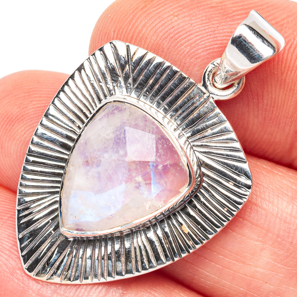 Sterling silver moonstone pendant with teardrop cabochon and sunburst halo, bail top