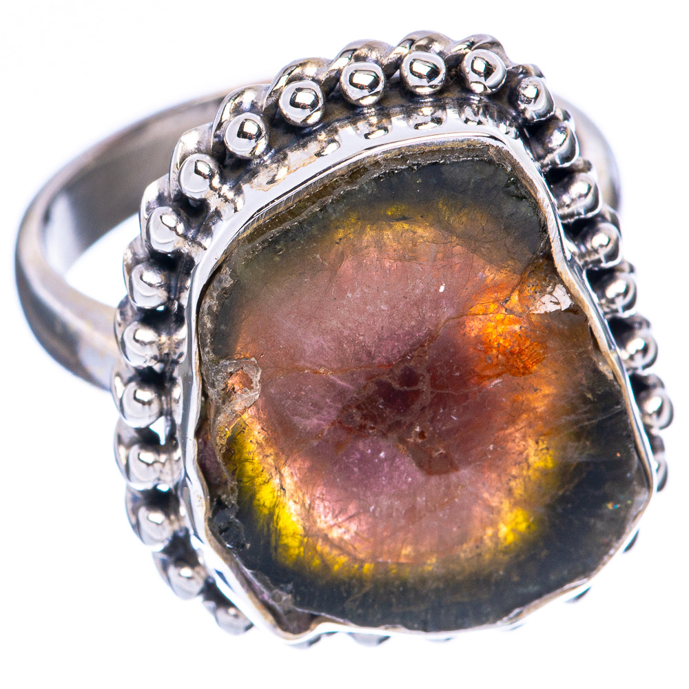 Sterling silver oval tourmaline ring with beaded halo and multicolor stone, purple and yellow highlights.