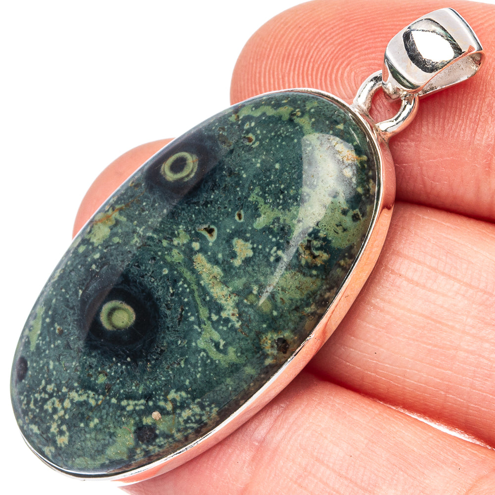 Kambaba jasper galaxy pendant in oval bezel, dark green with speckled pattern, silver bail
