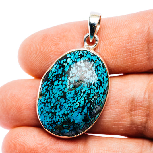Oval turquoise stone pendant with .925 sterling silver bail and metal frame