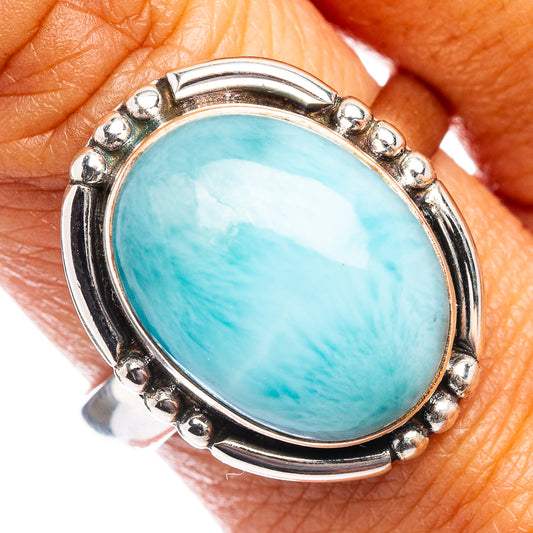 Sterling silver oval larimar cabochon ring with round bead accents, turquoise stone