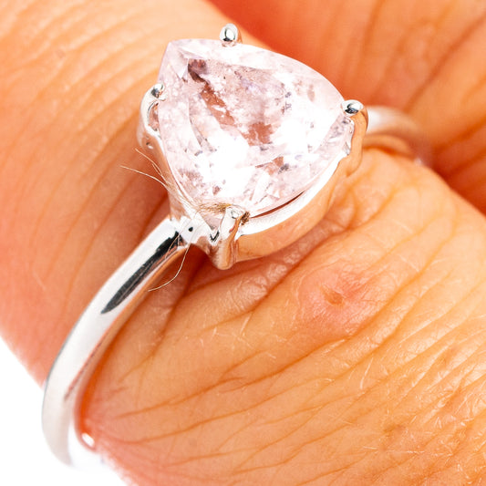 Sterling silver morganite ring close-up on hand, pink cushion-cut stone