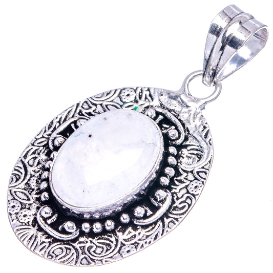 German silver oval moonstone pendant with filigree border, side view