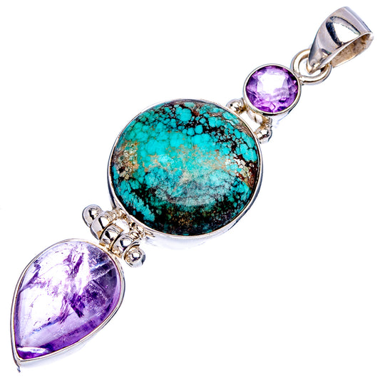 Sterling silver pendant with oval turquoise cabochon and two amethyst stones, bail top