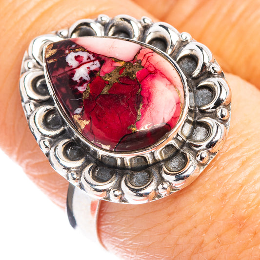 Sterling silver ring with oval red crackle stone and ornate scalloped setting