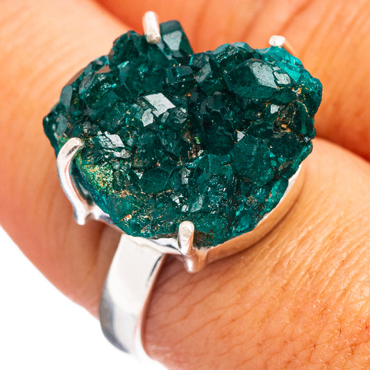 Dioptase ring, .925 sterling silver, green crystal with four open prongs