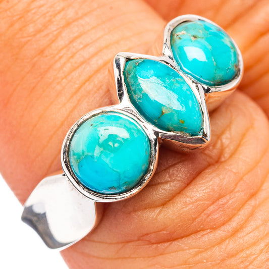 Sterling silver ring with three turquoise oval stones on hand, size 7